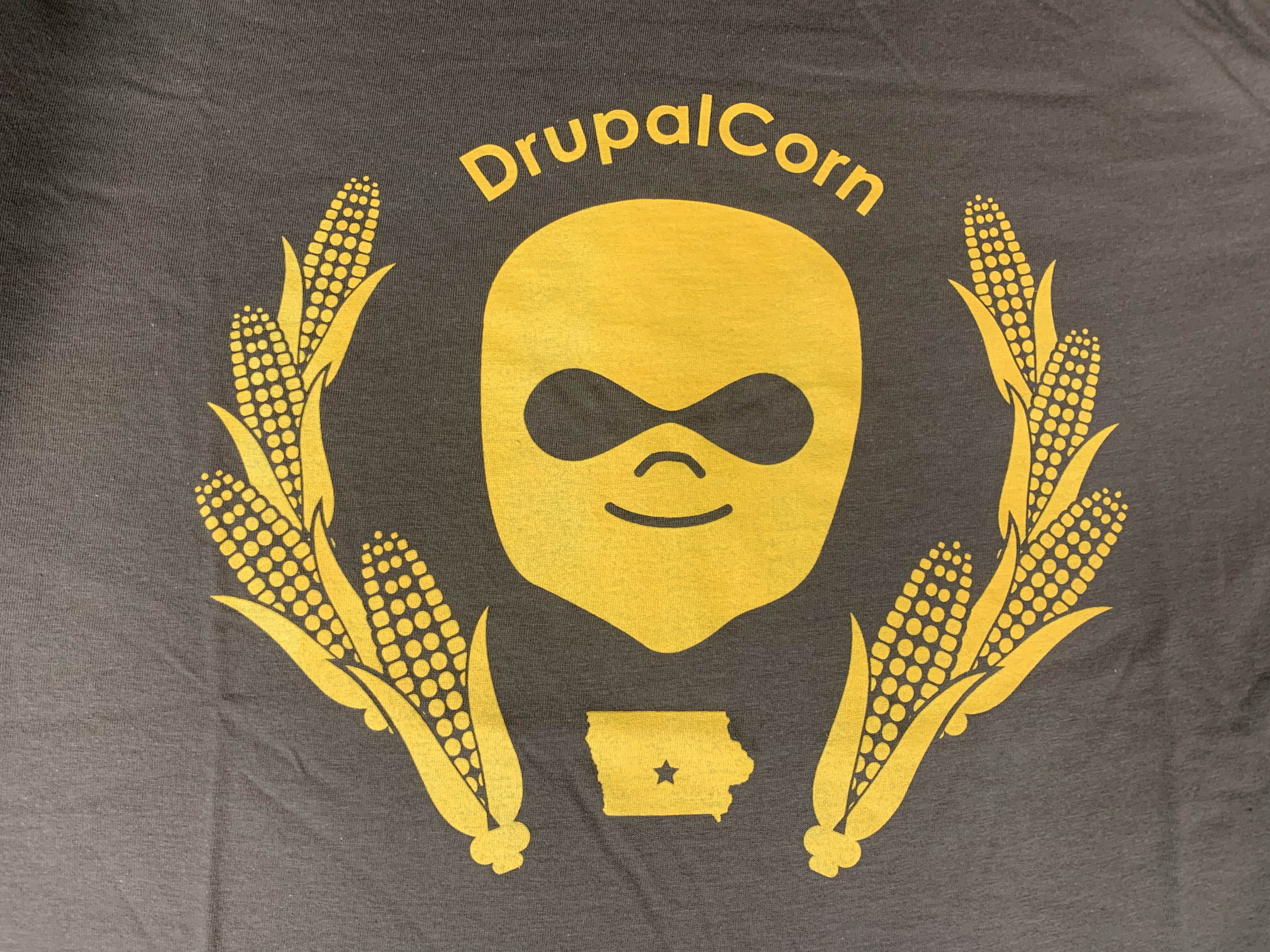 2018 DrupalCorn Shirt - Brown with yellow lines.